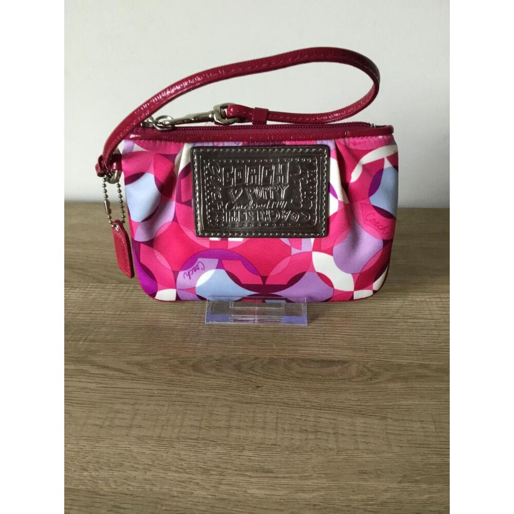 Coach Poppy Logo Wristlet with Metallic Silver-tone Embossed Plaque